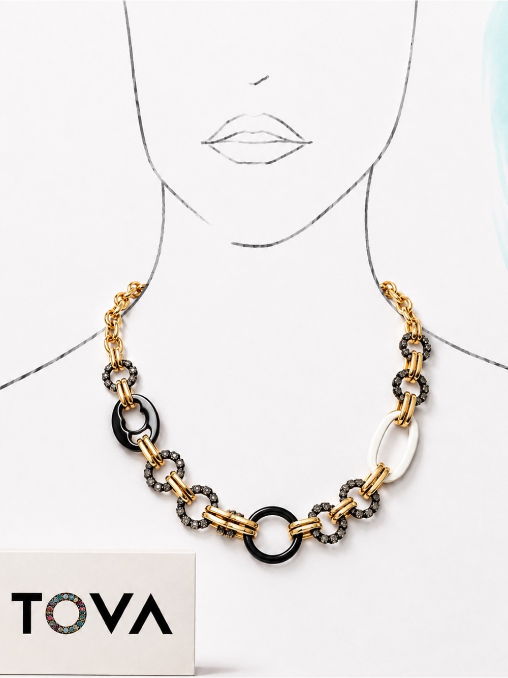 TOVA Reno Necklace 
White and black enamel with crystal accents.